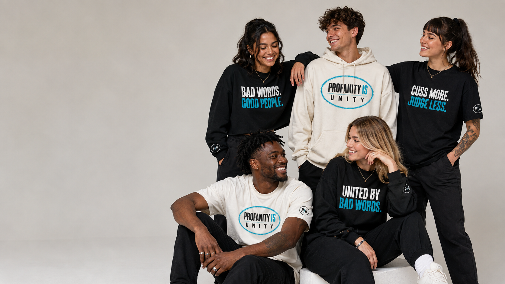 Five friends together in Profanity Is Unity hoodies, crewnecks, and tees